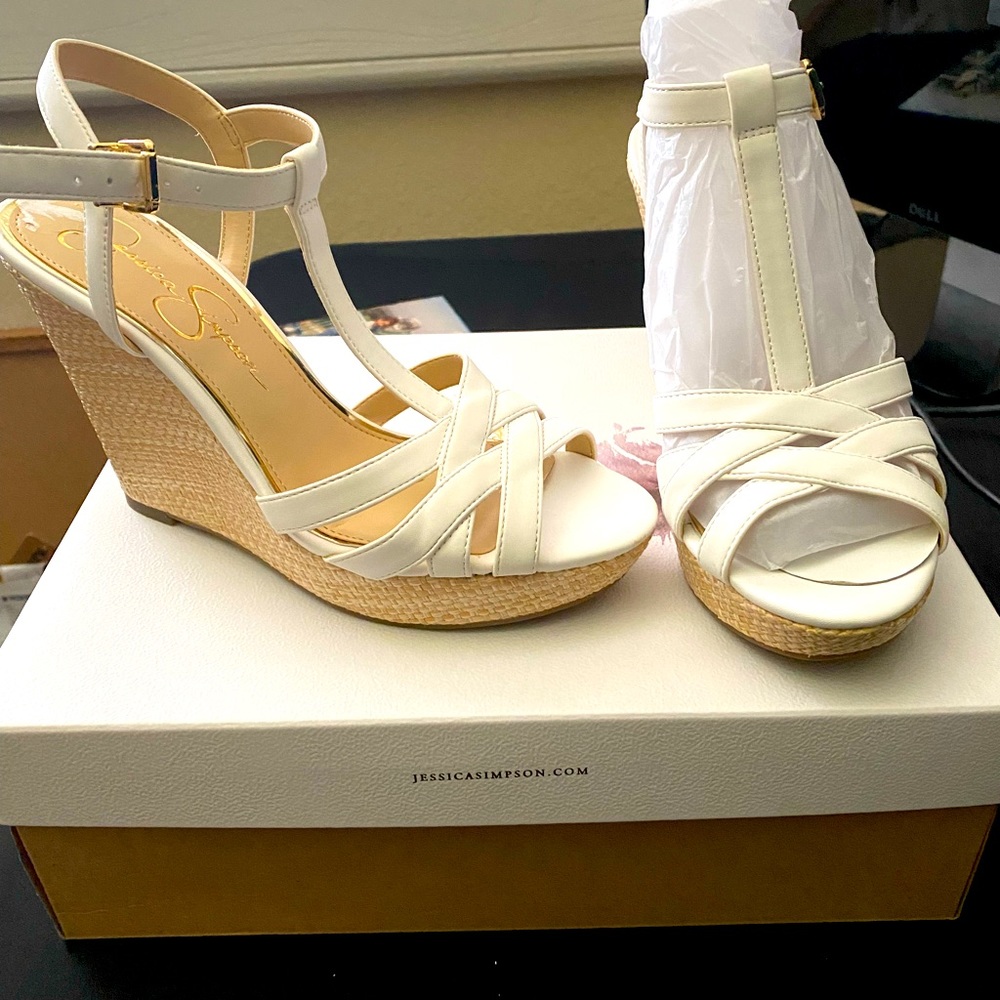Brand new. Jessica Simpson white wedges.